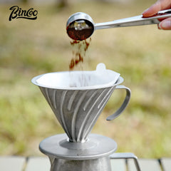 Bincoo reusable stainless steel V-shaped pour-over coffee dripper with handle.