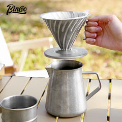 Bincoo reusable stainless steel V-shaped pour-over coffee dripper with handle.