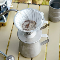 Bincoo reusable stainless steel V-shaped pour-over coffee dripper with handle.